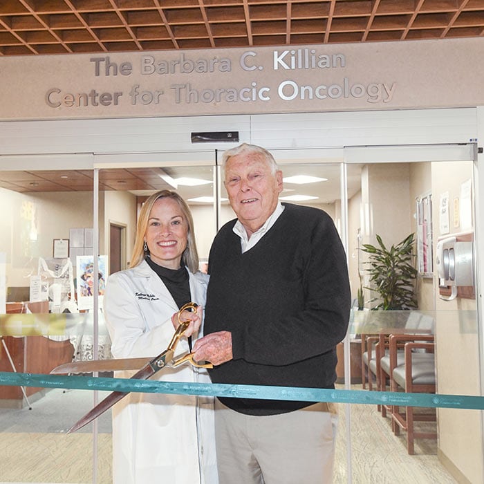 Dr. Kathryn Mileham, chief of thoracic medical oncology at Levine Cancer Institute, and John Killian